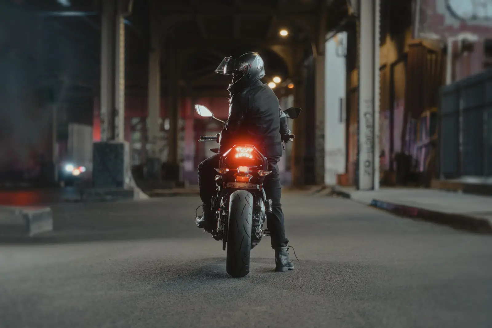 A motorcycle on a city street at night