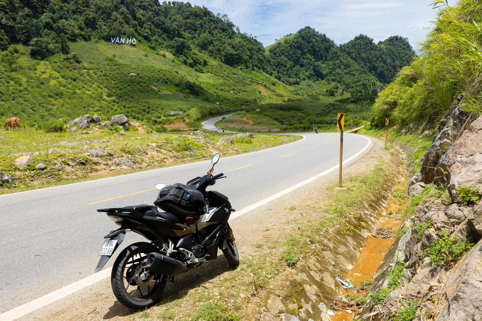 A motorcycle on a mountain road