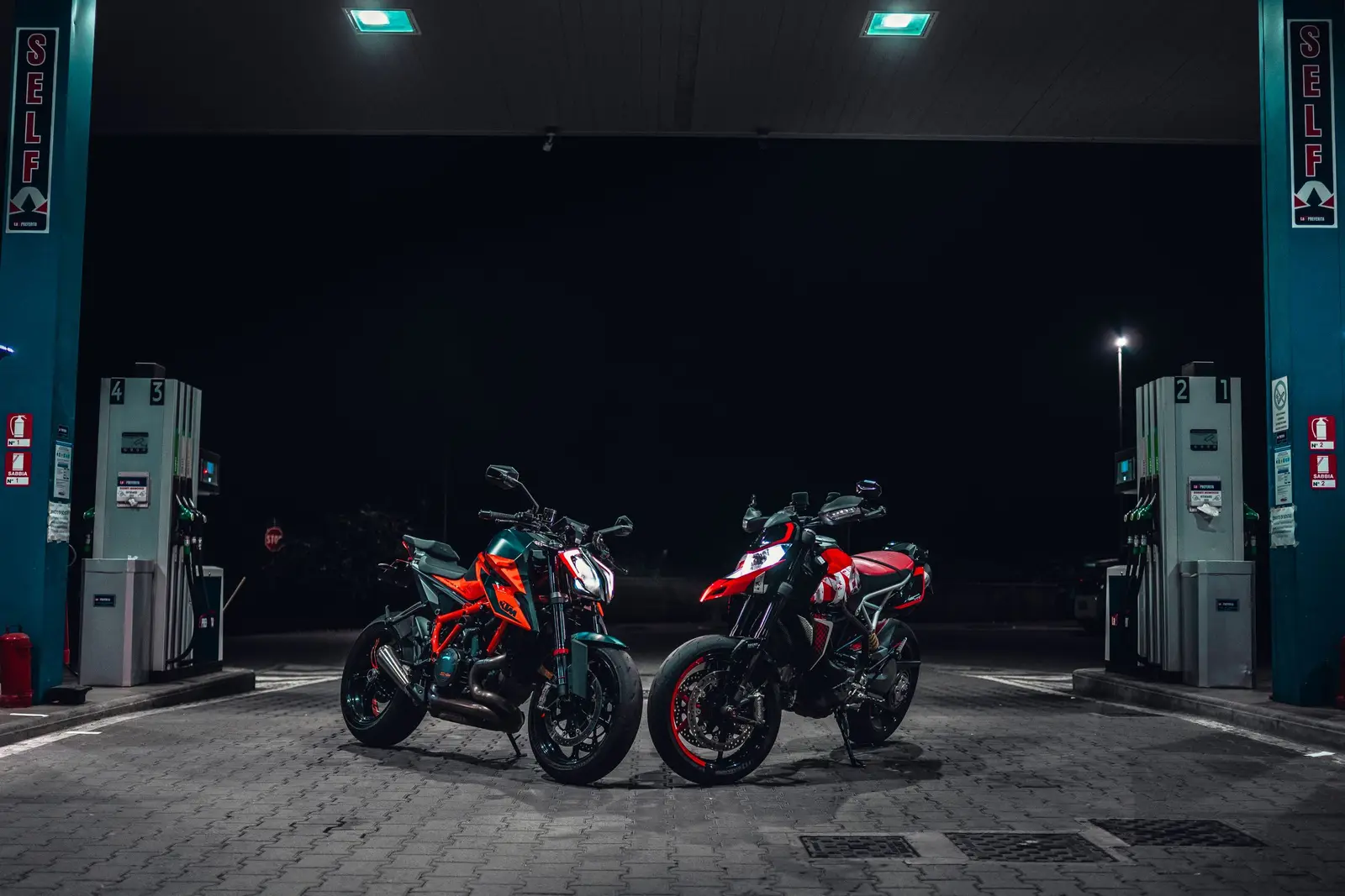 A motorcycle at a fuel stop