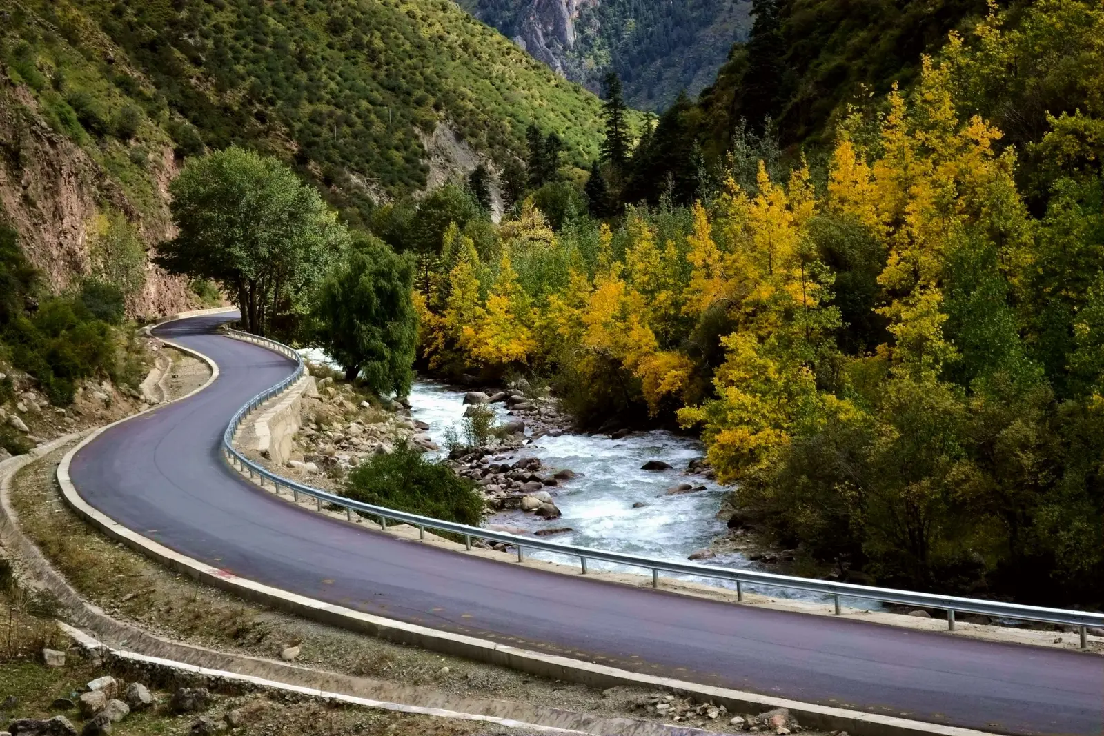 A road following a river valley