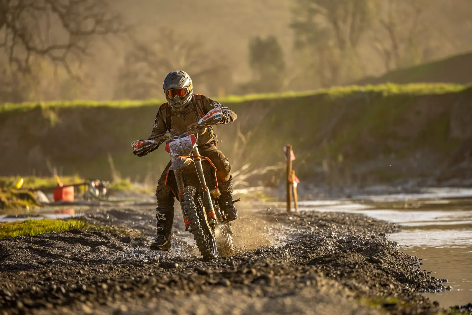 A motorcycle on a gravel road