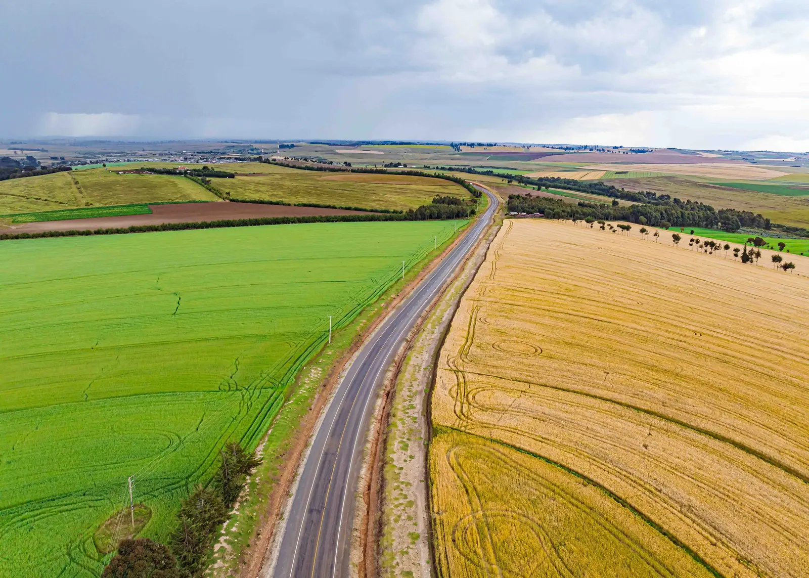 A country road through farmland