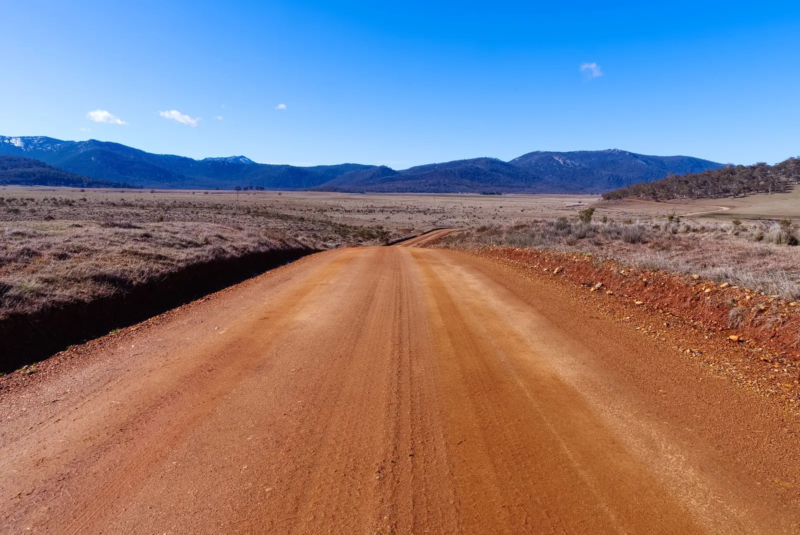 A red dirt road across outback country