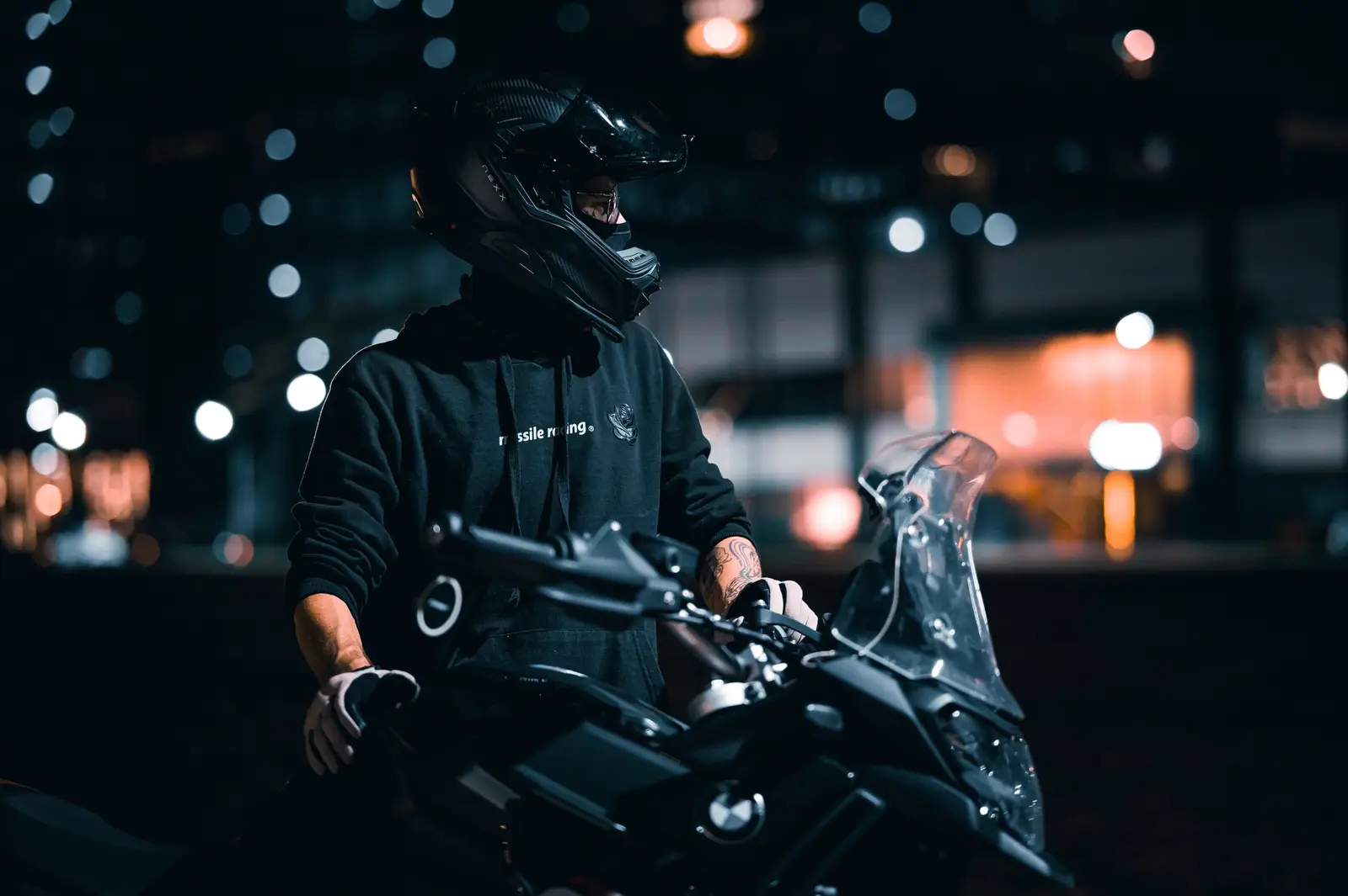 A motorcycle on a city street at night