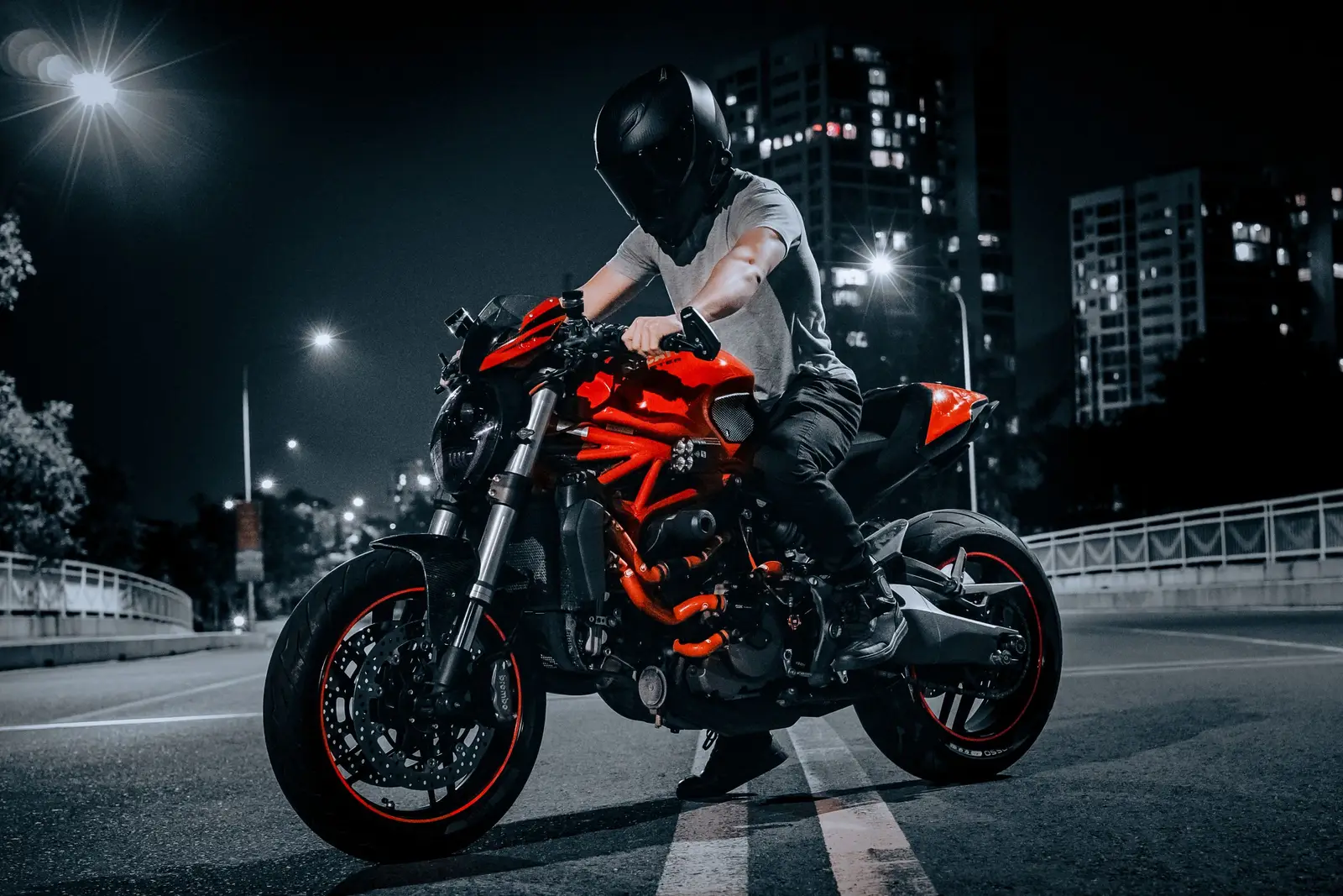 A motorcycle on a city street at night